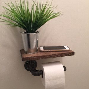 Toilet paper holder made from pipes